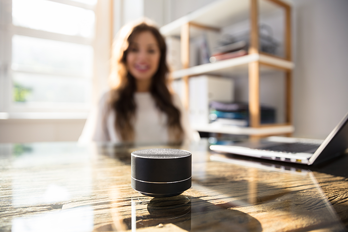 woman using Amazon echo