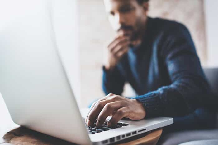 Man looking at a laptop